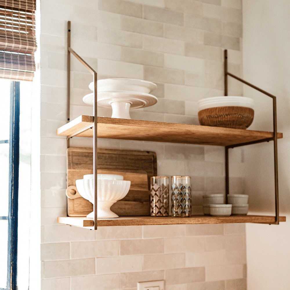 kitchern shelf showing bowls and cake stands