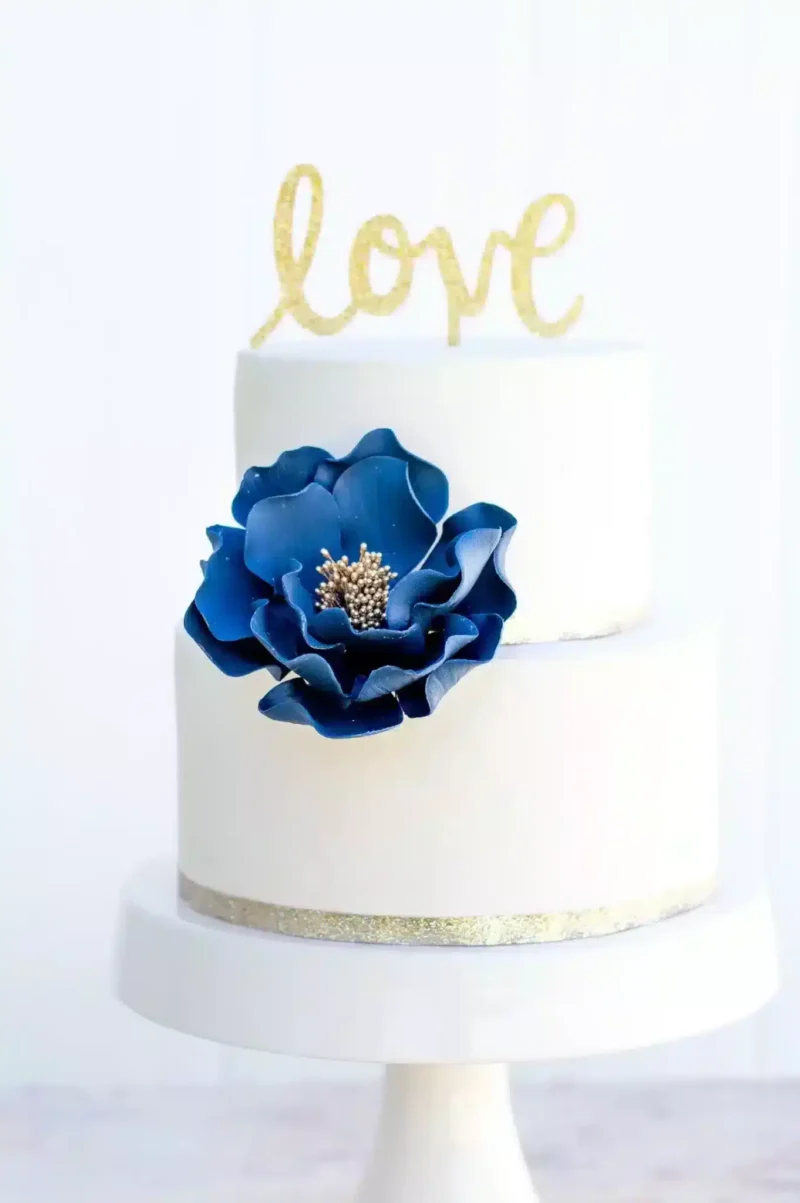 navy and gold open rose sugar flower