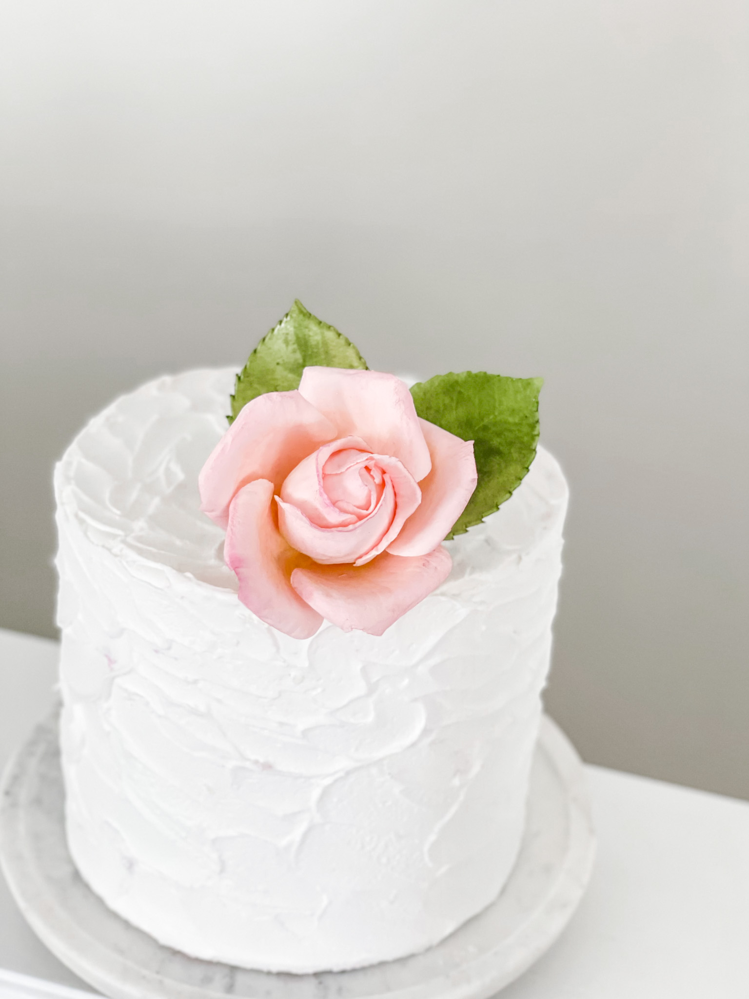 small blush rose sugar flower cake topper