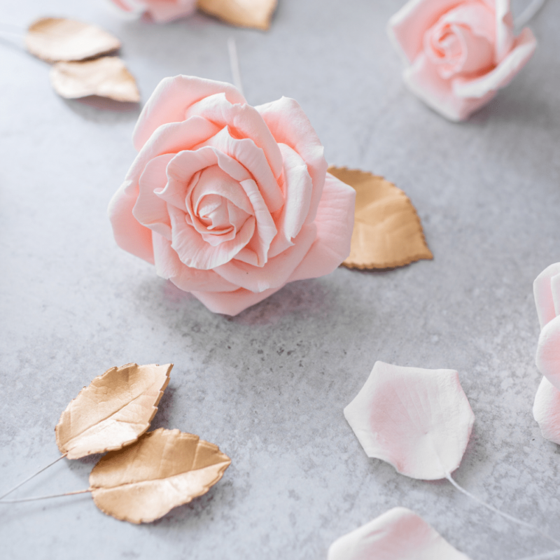 blush roses with gold leaves sugar flower display