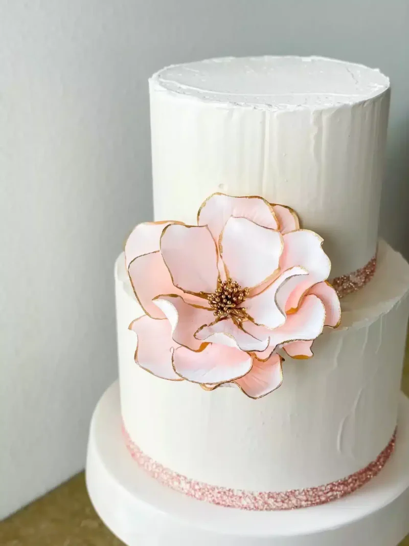 blush gold edged open rose sugar flower extra large on a two tier cake