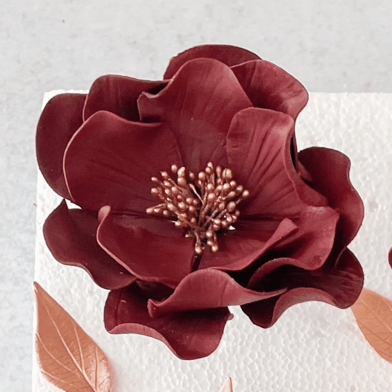 Burgundy + Rose Gold Open Rose Sugar Flowers by Kelsie Cakes